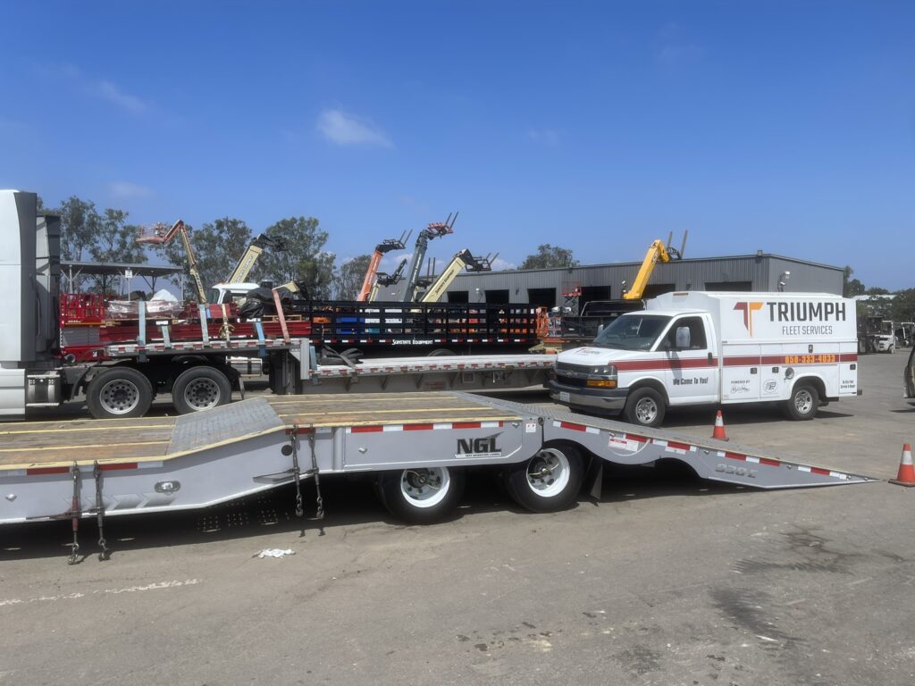 Triumph Fleet Services service truck at equipment yard.